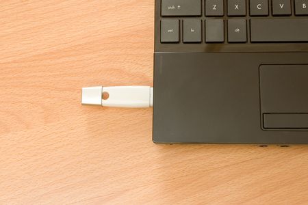 Laptop on Wooden Table