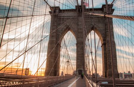 Brooklyn Bridge on the sunrise in the morning lights, New York, New York state, USAの写真素材