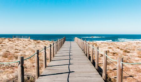 Wooden footpath at the beach. Portugalの写真素材