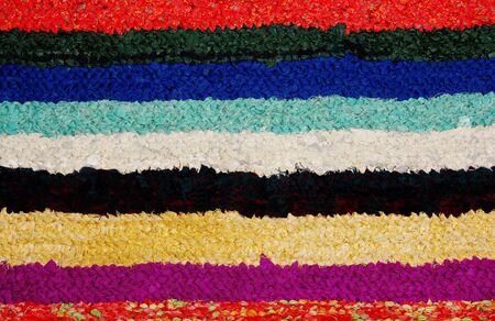 rug handmade knitted from strips of fabric, colored の写真素材