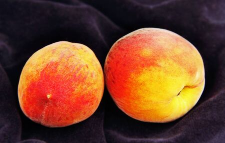 Ripe peaches closeup の写真素材