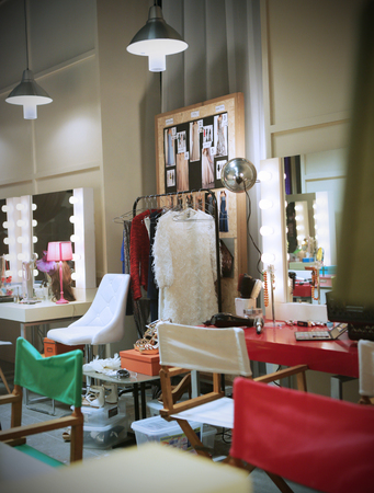 red, white and green chair put in the backstage of fashion showのeditorial素材