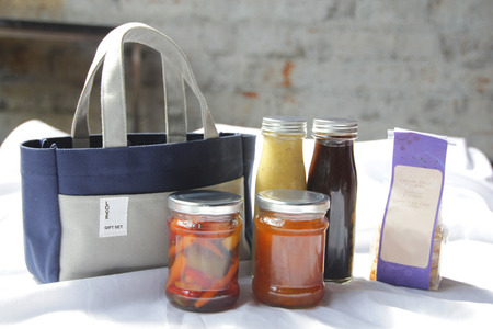 Pickles, Kumquat marmalade, Balsamic and mustard seeds dressing, French lavender and honey dressing, Cookiesの写真素材