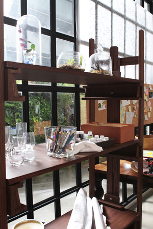 pens and bottle of acrylic color put on the shelf in art studioの写真素材