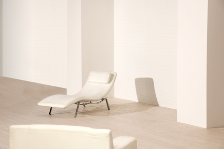 Daybed sofa put on the wooden floor of white terrace in summer time