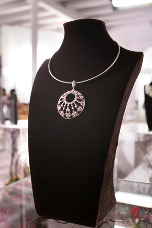 a fake diamond round floral necklace in jewelry store set used for shooting a movieの写真素材