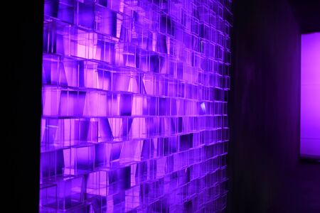 a block background made from many plastic square blocks put in random positionの写真素材