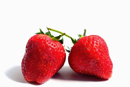 Closeup red strawberry isolated fruit on white background, natural foodの写真素材