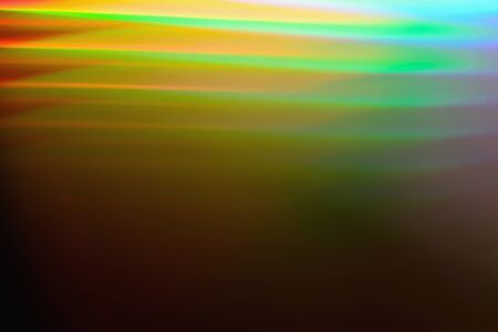 Abstract gradient blurred multicolored rainbow light spectrum background.