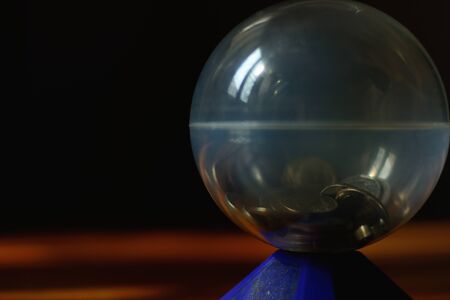 Piggy bank isolated on black background with copy space.