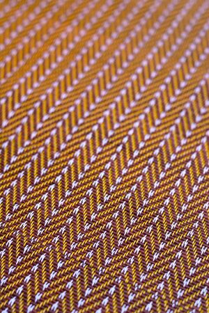 Plastic weave mat in brown color tone pattern background.の写真素材