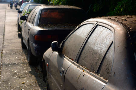 Chiang Mai, Thailand - September 5, 2020. Dirty and wreck cars  at the car cemetery.の写真素材