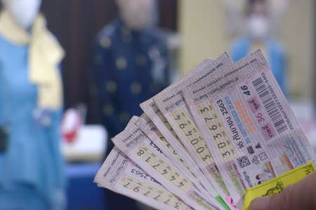 Chiang Mai, Thailand - Sep 24, 2020: Thai lotto in front of PC monitor that broadcasting result of the prize.のeditorial素材