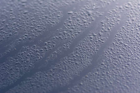 Abstract water drop stain on car with natural background