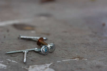 Nut,  screw,  tools for general mechanic on natural background.の写真素材