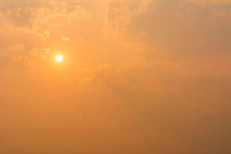 Golden light of sunset in sky with clouds for wallpaper.の写真素材