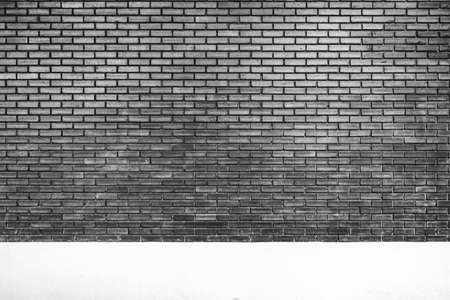 Empty gray brick wall texture. Abstract pattern background.の写真素材