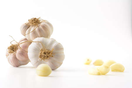 Close up raw garlic isolated on white backgroundClose up raw garlic isolated on white background.の写真素材