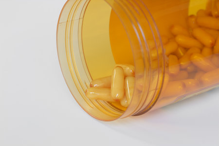 Royal jelly capsules on natural white background. Supplementary food for health.の写真素材