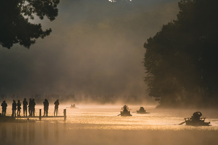 Bamboo rafting on river with sunlight enters the coniferous forest on a foggy spring morning, Scenic viewpoint Pang Oung District Animal Area, Mae Hong Son (Thailand) selective focus.のeditorial素材