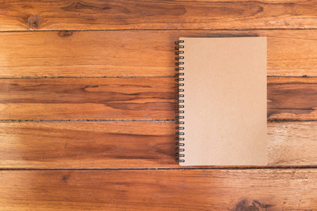 View from above of office equipment on a wooden background.の写真素材