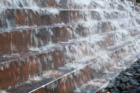 Waterfall down the ladder to stoneの写真素材