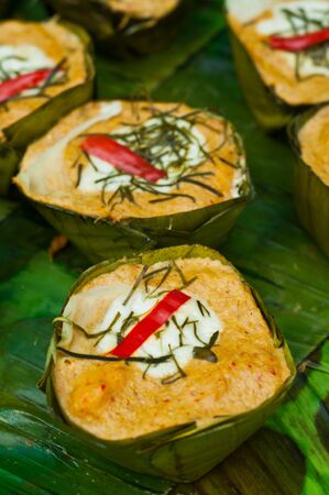 Steamed fish with curry paste in Thai food styleの写真素材