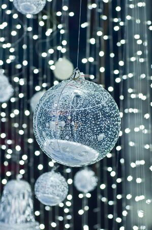 Sparkle of big balls with white lighting backgroundの写真素材