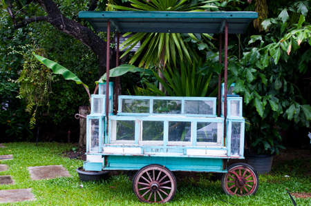 Vintage wooden trolley wheel in Thai styleの写真素材