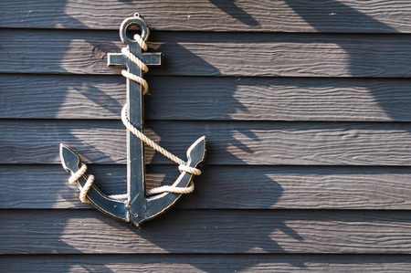 Anchor on the wooden wallの写真素材