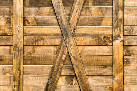 Old wooden doors of warehouse の写真素材