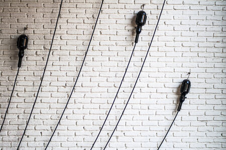 Line of eletrical on the brick wallの写真素材
