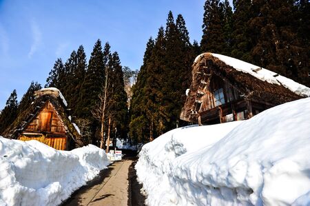 Road to the old wooden house on snowy mountain in Shirakawa Go villageのeditorial素材
