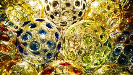 Orange lighting effect on glass ballの写真素材