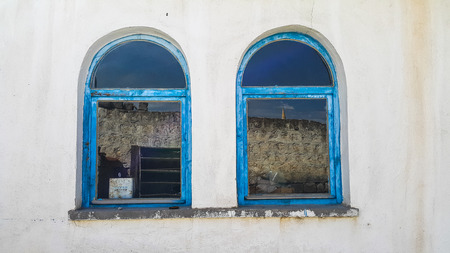Old curved windowの写真素材