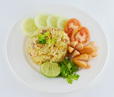 Rice with vegetables and sausagesの写真素材