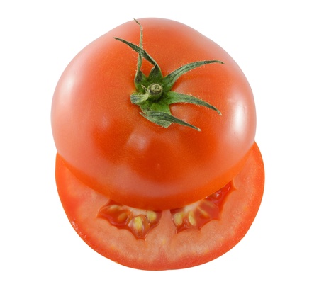 chopped tomato isolated on white backgroundの写真素材