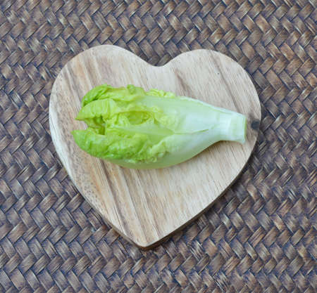 Lettuce on a wooden の写真素材