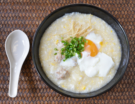 Thai style breakfast with pork and soft-boiled eggの写真素材