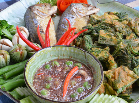 Fried Mackerel fish,chili sauce ,and fried vegetable with eggの写真素材