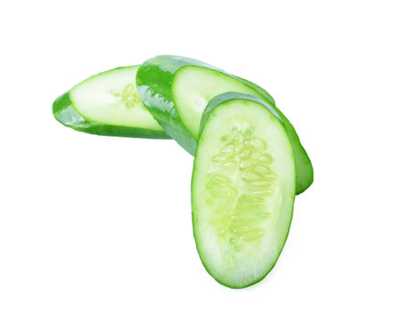 Cucumber and slices on white background.の写真素材