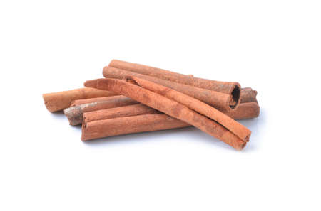 Cinnamon sticks on white background