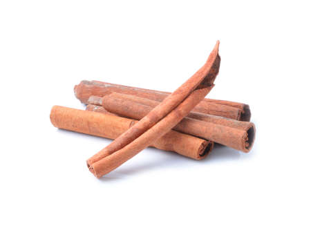 Cinnamon sticks on white background