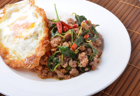 Thai spicy food, stir fried pork whit basilの写真素材