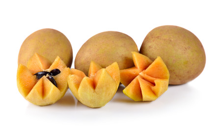 fresh sapodilla fruits on white backgroundの写真素材