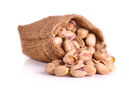 Pistachio nuts. Isolated on a white background.の写真素材