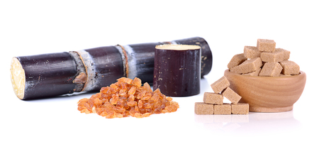 sugar cane and Brown sugar on white background.の写真素材