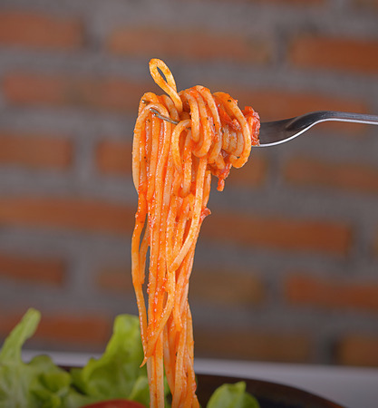 Spaghetti with tomato sauce close upの写真素材