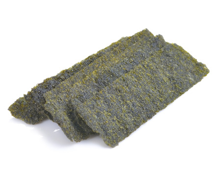 Sheet of dried seaweed, Crispy seaweed isolated on white backgroundの写真素材