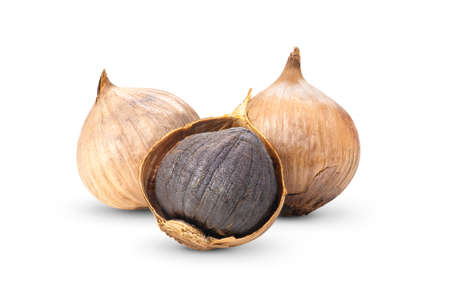 Black garlic on white backgroundの写真素材